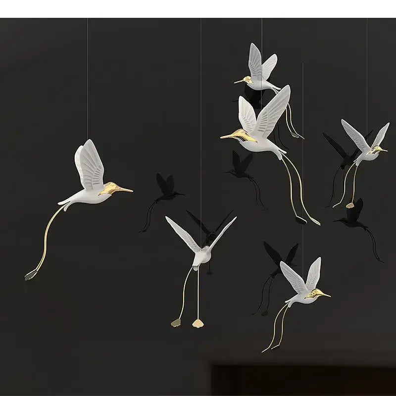 Suspension design oiseaux lumineux blanc et doré moderne