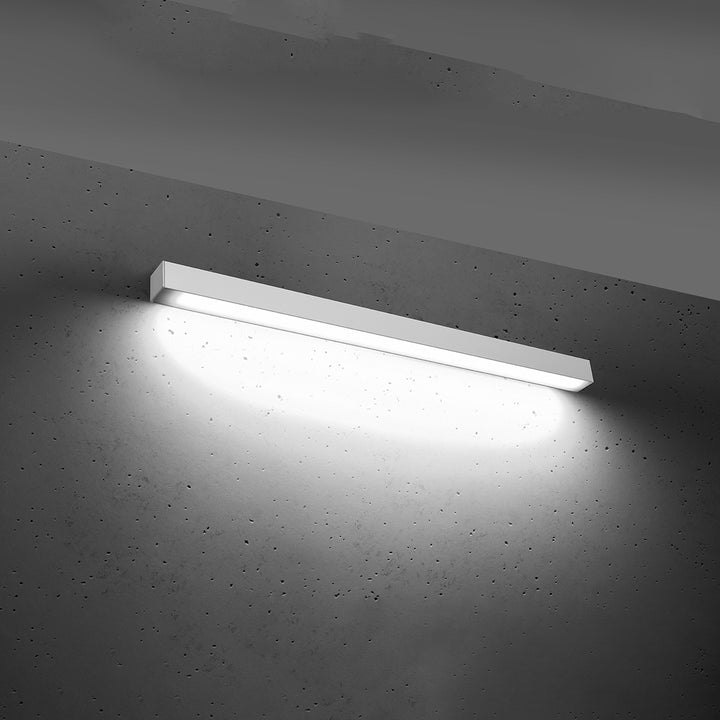 Applique murale linéaire PINNE blanc allumée, lumière vers le bas