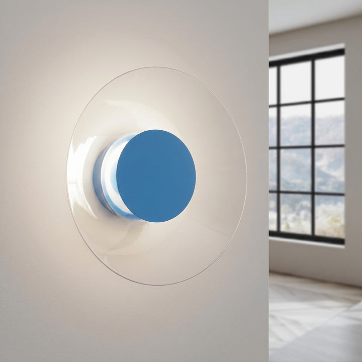 Applique murale ASTRO bleu clair allumée, halo derrière le disque