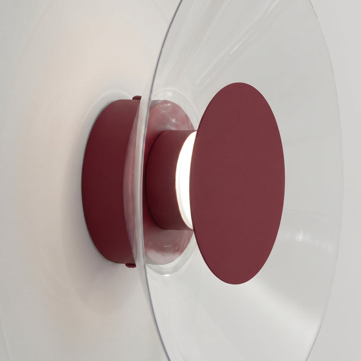 Applique murale ASTRO bordeaux vue de profil, disque transparent