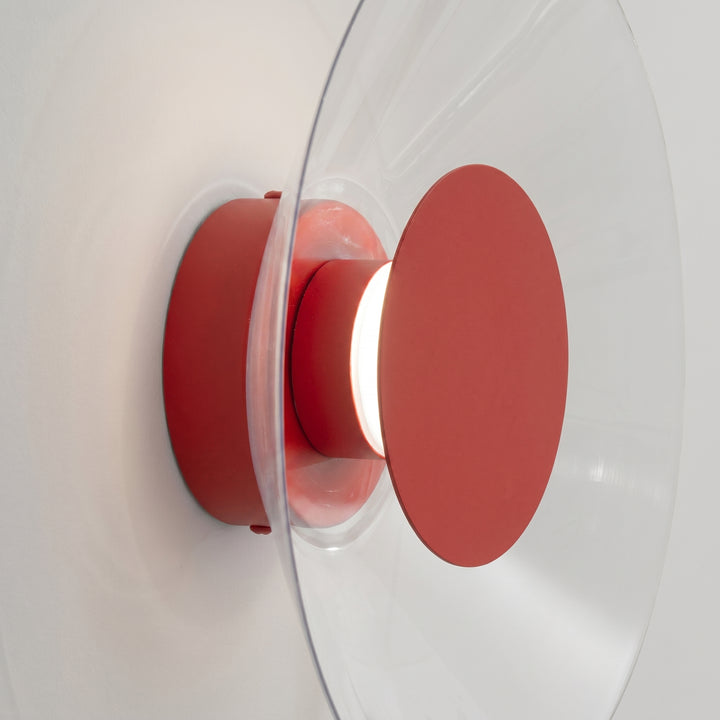 Applique murale ASTRO rouge vue de profil, disque transparent