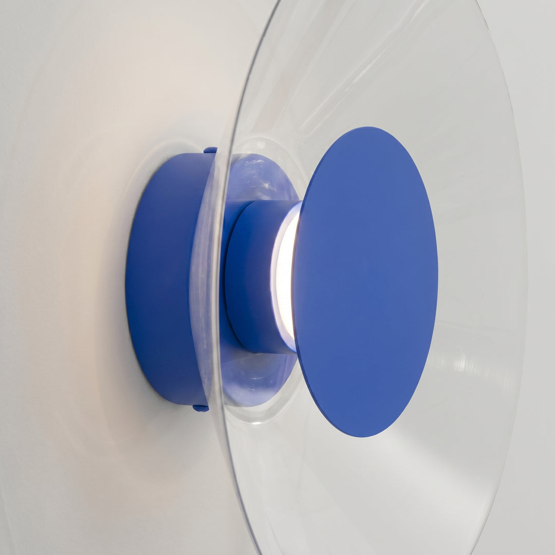 Applique murale ASTRO outremer vue de profil, disque transparent