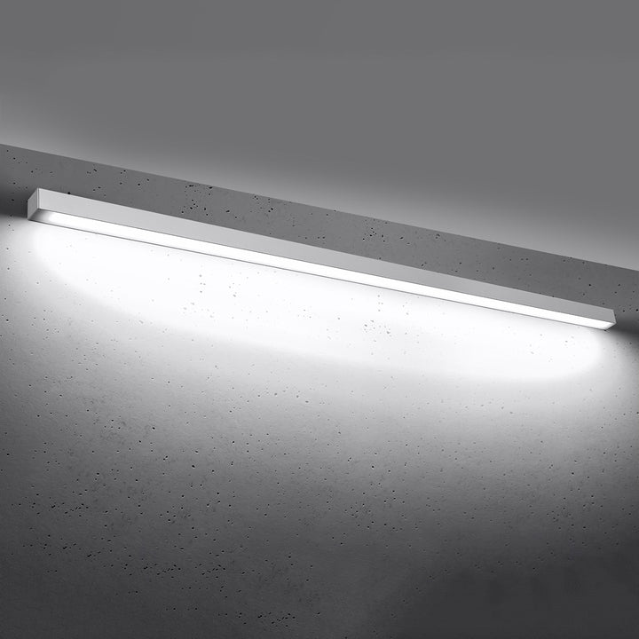 Applique murale linéaire PINNE blanc allumée, lumière vers le bas