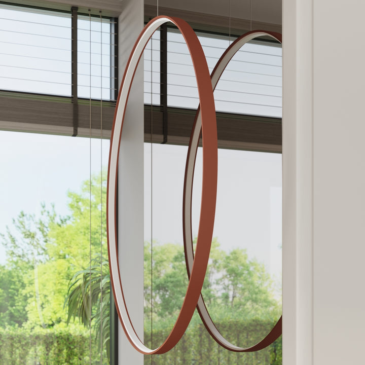 Suspension anneau RIO ocre rouge dans un intérieur contemporain