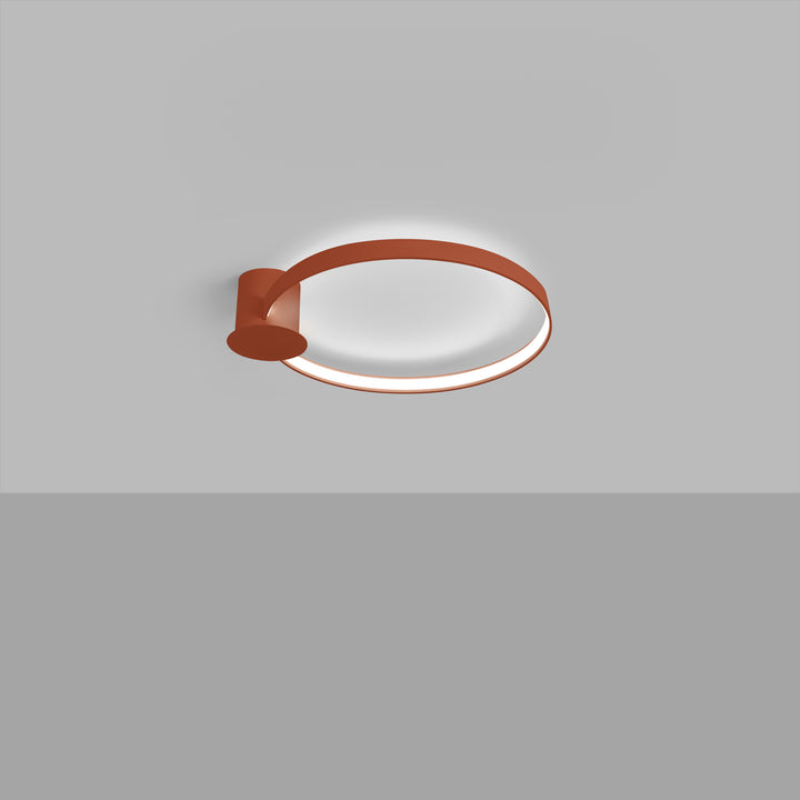 Plafonnier anneau RIO ocre rouge allumée, au plafond