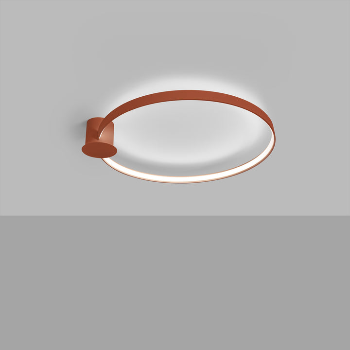 Plafonnier anneau RIO ocre rouge allumée, au plafond