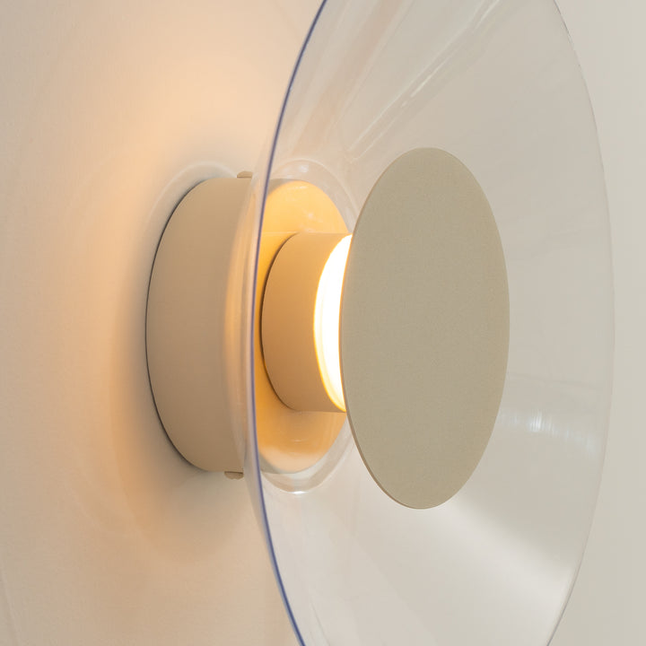 Applique murale ASTRO beige vue de profil, disque transparent