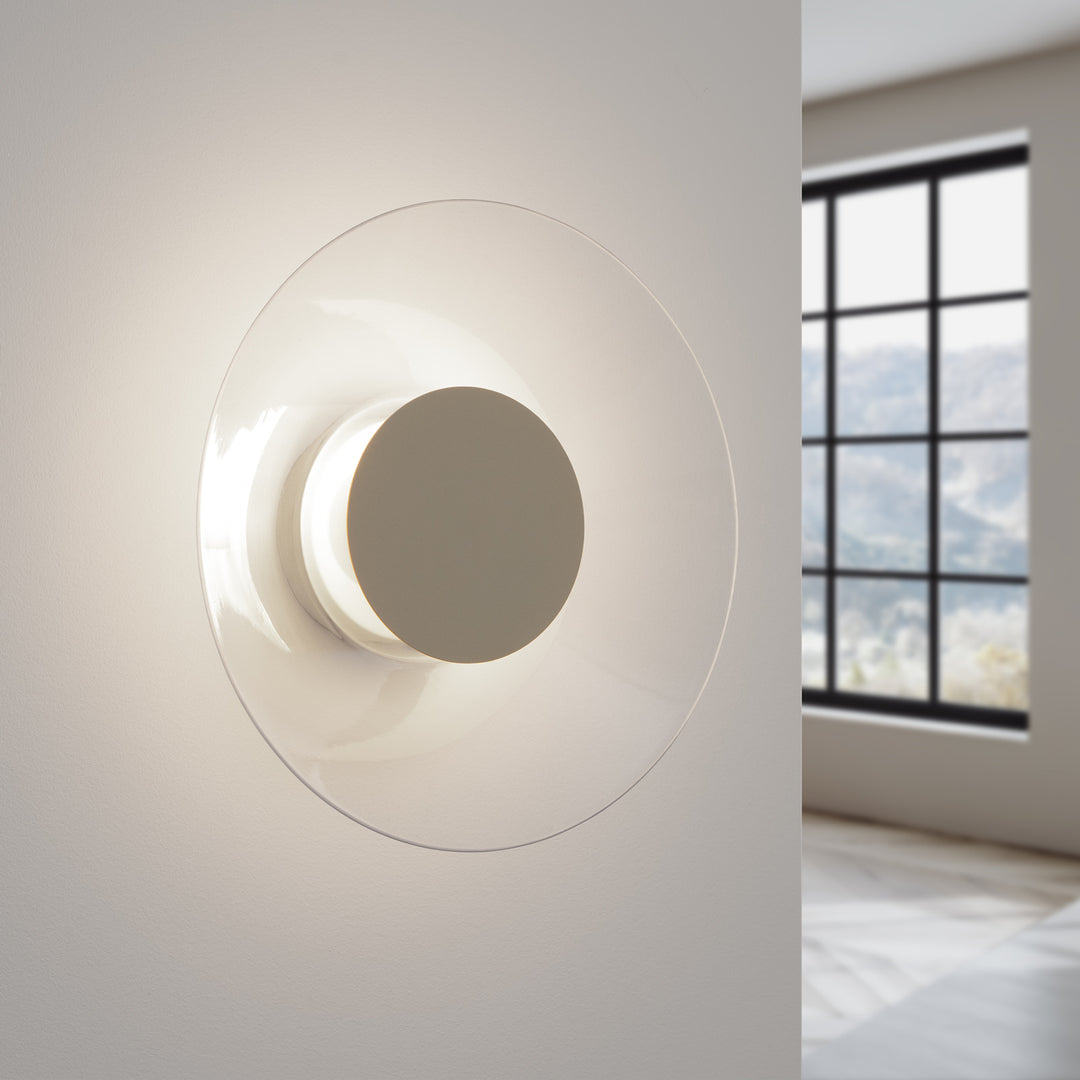 Applique murale ASTRO beige allumée, halo derrière le disque