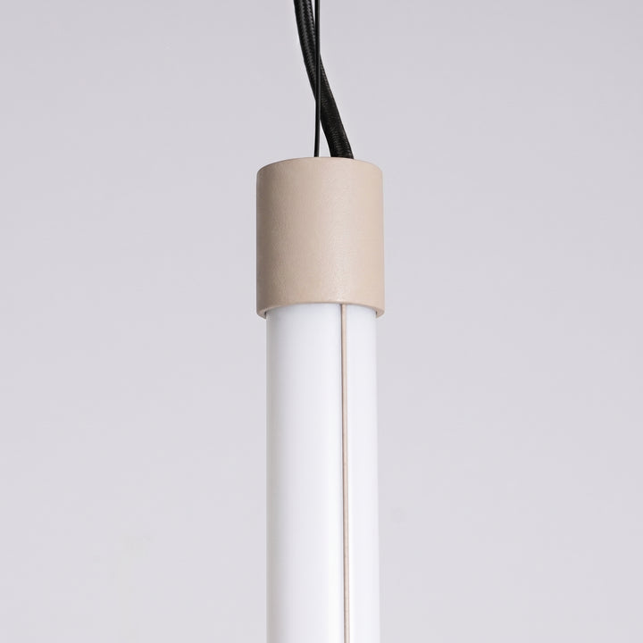 Suspension tube TRANG taupe détail de l'embout