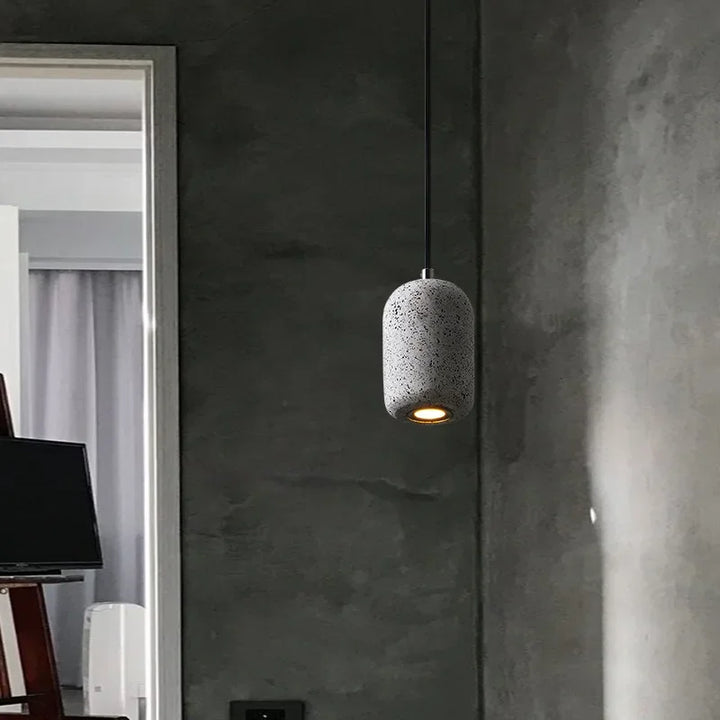 Suspension luminaire fine ovale pour éclairer une tête de lit moderne

