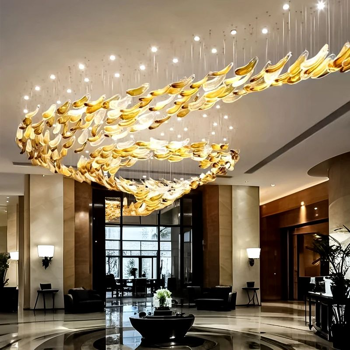 Suspension Cascade Cristal Doré Feuilles Sculpturales Moderne Chic