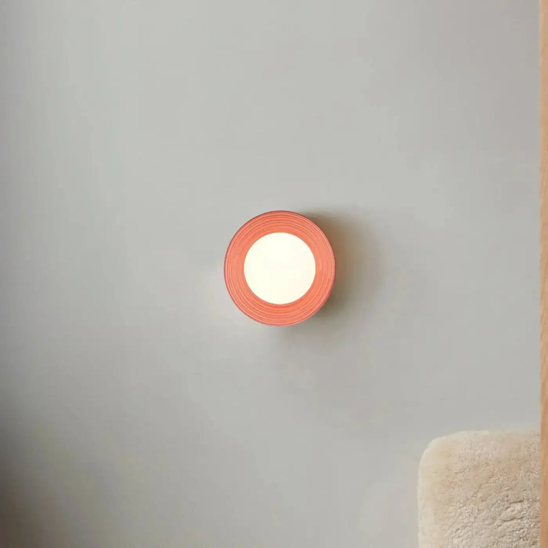 Applique murale alicia avec lumière led corail circulaire et centre lumineux blanc doux avec bord texturé en couches