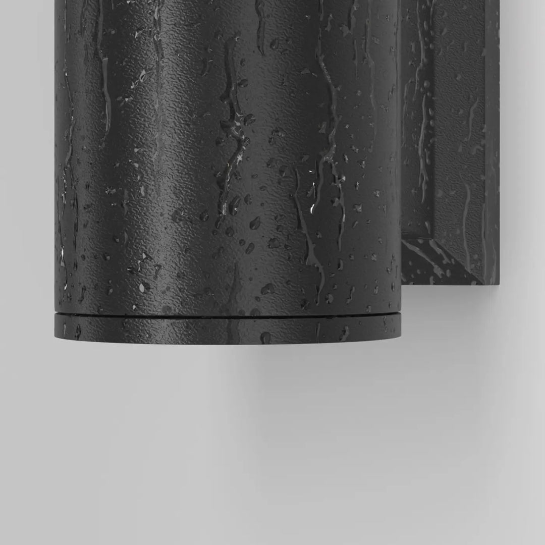 Applique extérieure bowery cylindre en aluminium thermolaqué noir mat avec ampoules gu10 et finition texturée humide
