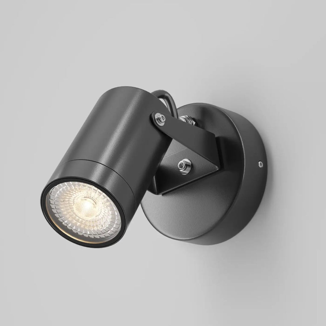 Applique extérieure scope projecteur orientable en acier noir mat avec fixation murale circulaire et vis apparentes