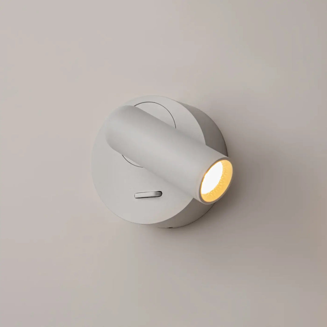 Applique liseuse mirax module rond blanc avec tête cylindrique moderne et lumière chaude ciblée pour lecture murale