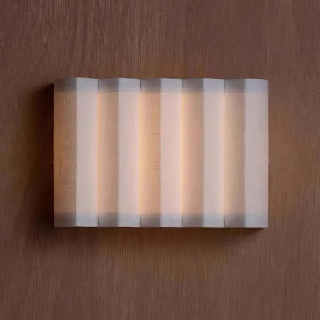 Applique murale en accordéon à base de tissue blanc

