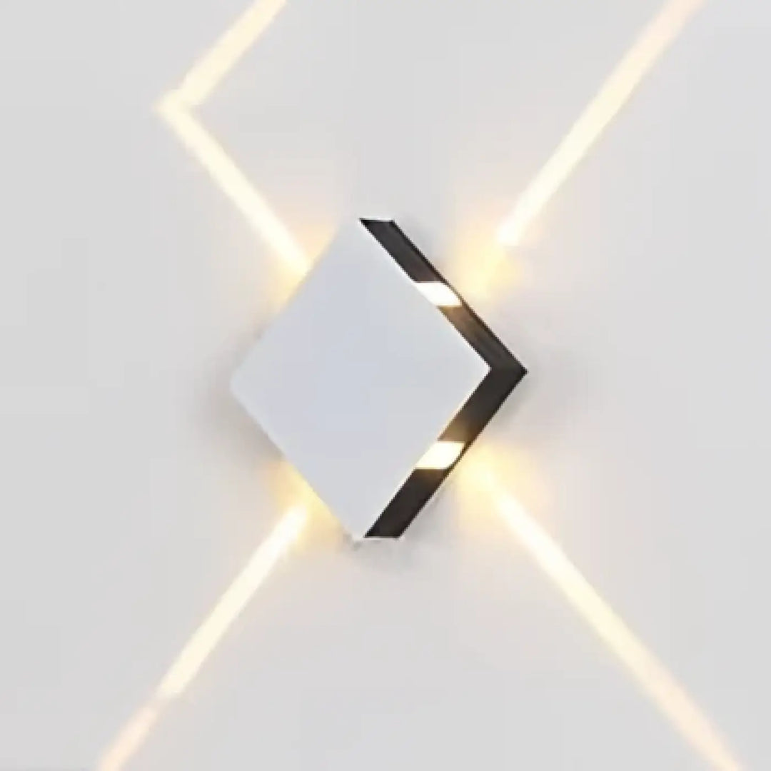 Applique murale contemporaine xelio en design géométrique blanc et noir émettant une lumière ambiante chaude