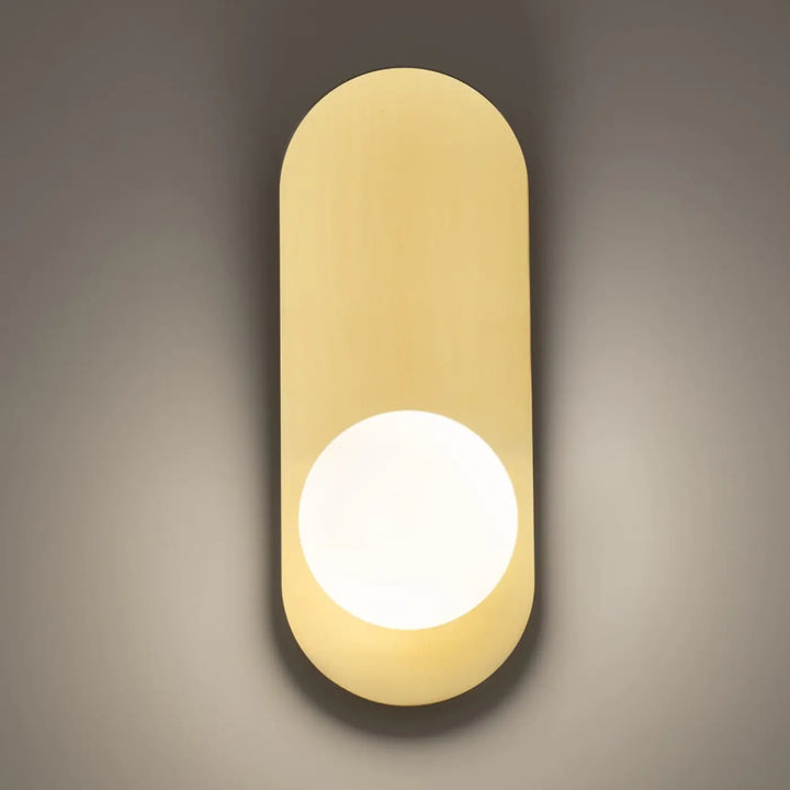 Applique murale bao minimaliste avec corps ovale mat jaune chaud et diffuseur en verre blanc mat circulaire