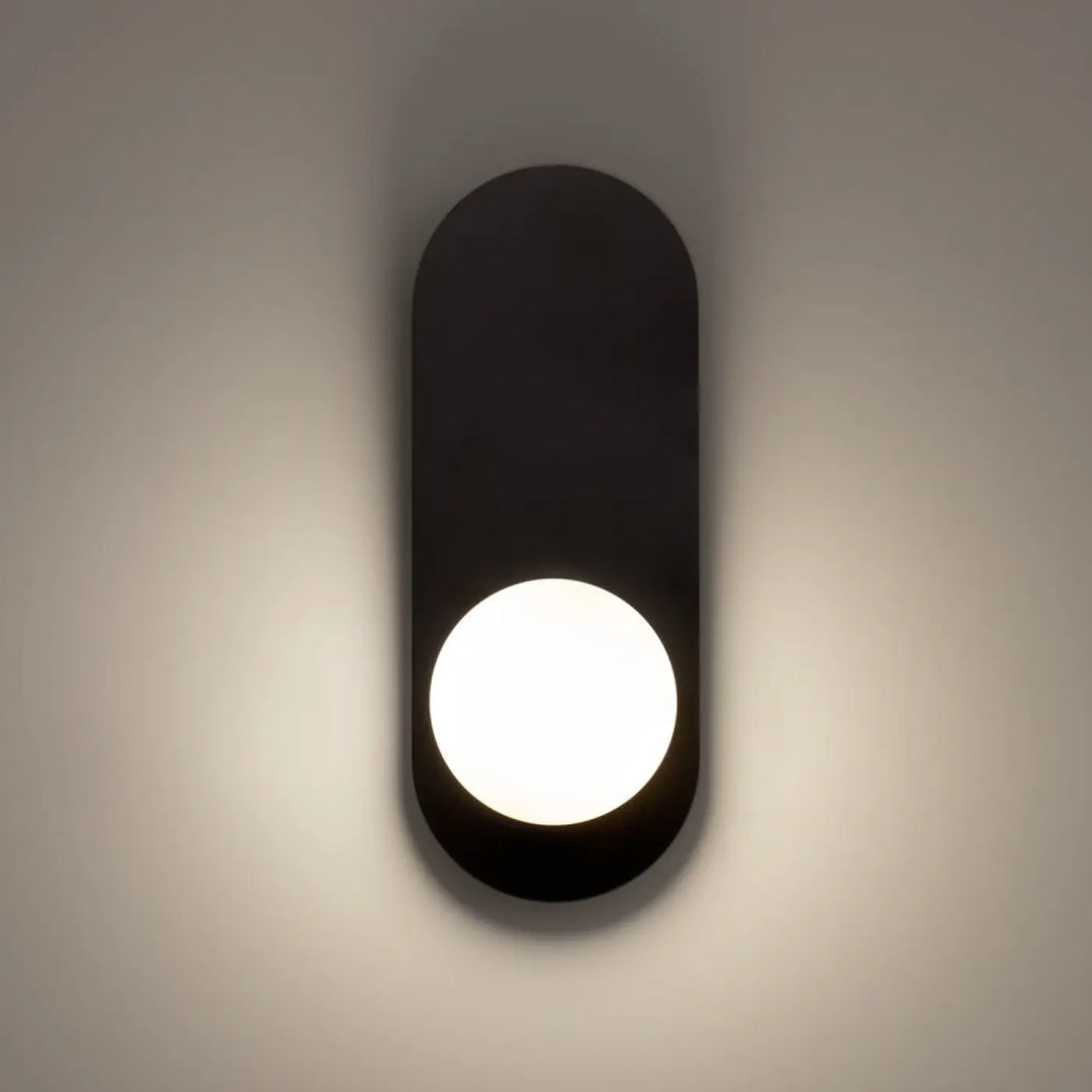 Applique murale bao noire moderne avec design ovale allongé et verre blanc mat éclatant circulaire