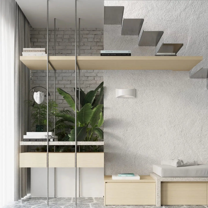 Modern minimalist shelving unit with light wood shelves and sleek metal supports complementing l’applique murale vixen céramique enduit structuré