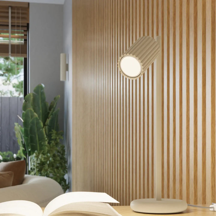 Applique murale karbon 10 beige design minimaliste avec corps cylindrique à rainures verticales et ampoules gu10 interchangeables