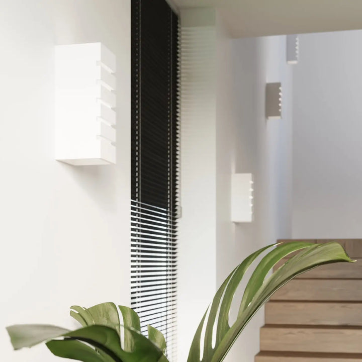 Applique murale céramique samir blanche avec design moderne en marches offrant une belle lumière décorative