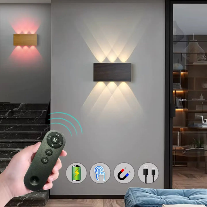 Applique murale muled noire avec trois spots led réglables offrant un éclairage led intégré et une lumière douce design naturel