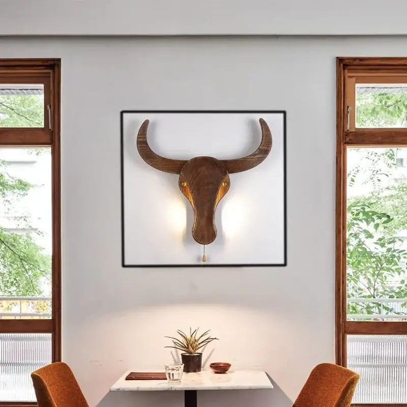 Applique murale en bois tête d’animal style sculptural

