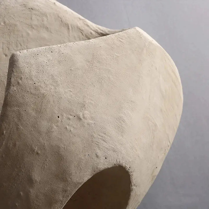 Applique murale cocon en pierre beige

