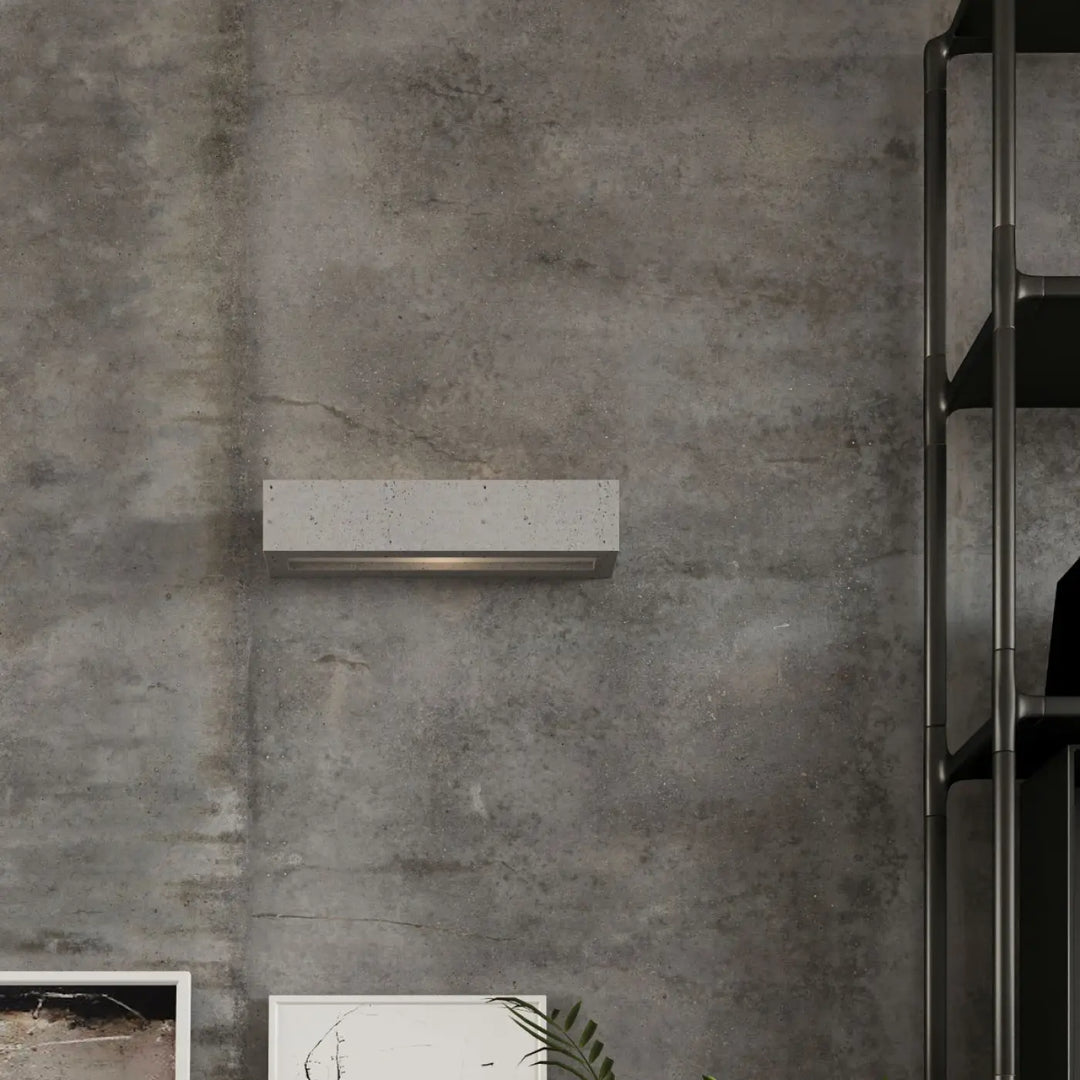 Applique murale vega 30 en béton moderne avec finition texturée et contour métallique pour une atmosphère harmonieuse