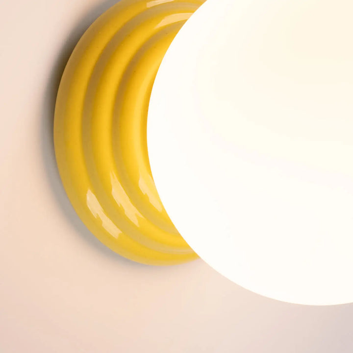 Applique murale lampe zori jaune en céramique brillante avec motifs concentriques pour une belle décoration aux qualités esthétiques