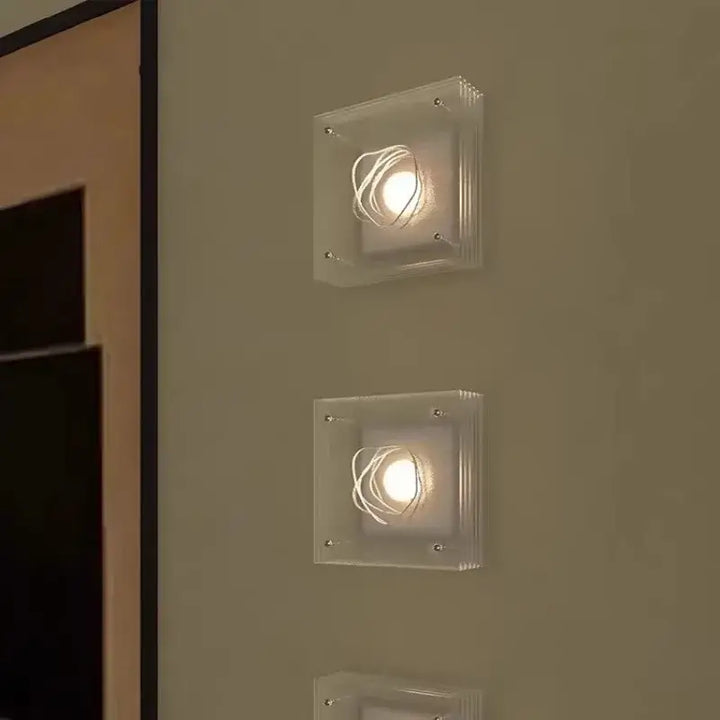 Applique design carrée en verre transparent beige élégante