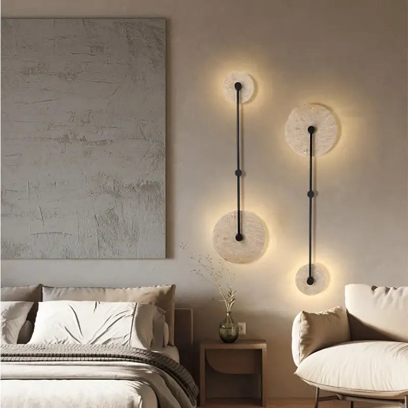 Applique murale design moderne en pierre et métal avec éclairage LED

