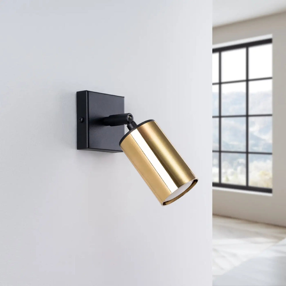 Applique murale lampe winx allie or noir avec spot cylindrique finition dorée et support mural carré noir design moderne