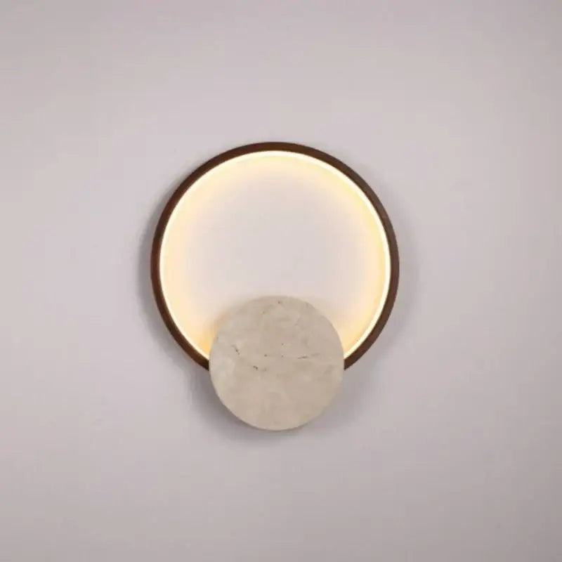 Applique murale design ronde pierre et métal design épuré