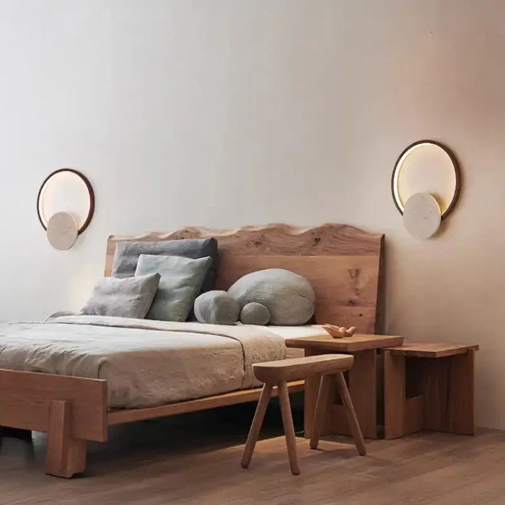 Applique murale design ronde pierre et métal design épuré