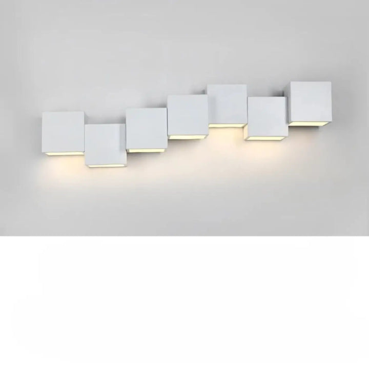 Applique murale kubora en forme de cube blanc moderne avec effet lumineux led chaud et carrés flottants design