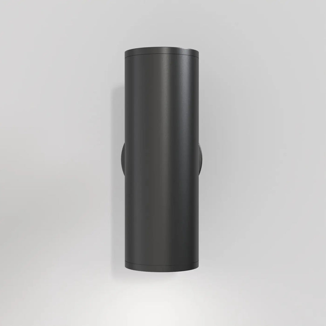 Matte black cylindre géométrique applique murale focus with sleek minimalist design, wall-mounted lighting fixture