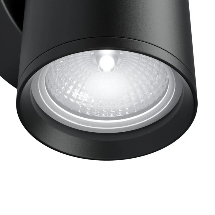 Applique murale focus cylindre noire avec lentille texturée et bordure argentée pour éclairage extérieur
