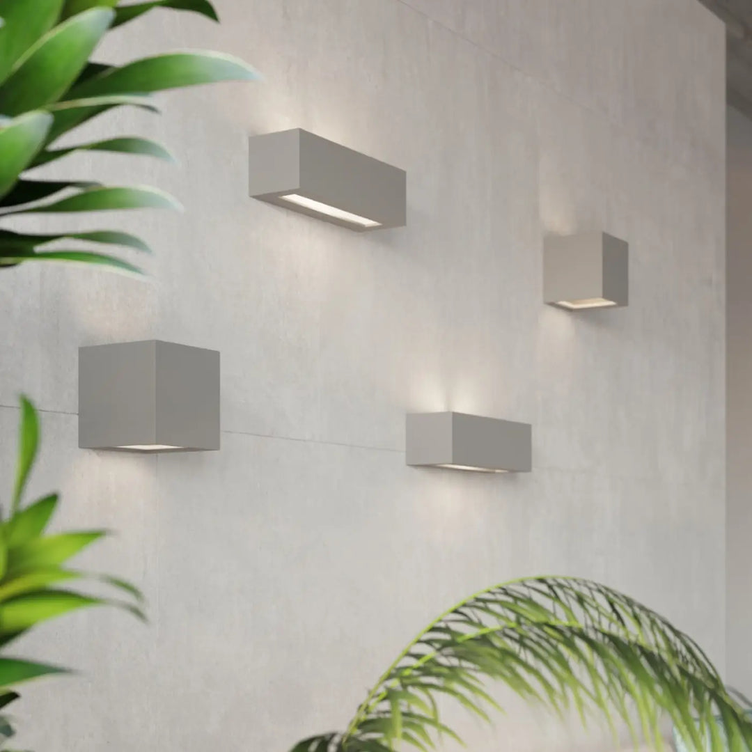 Applique murale en céramique vega gris avec design minimaliste moderne et lumière blanche douce pour intérieur contemporain