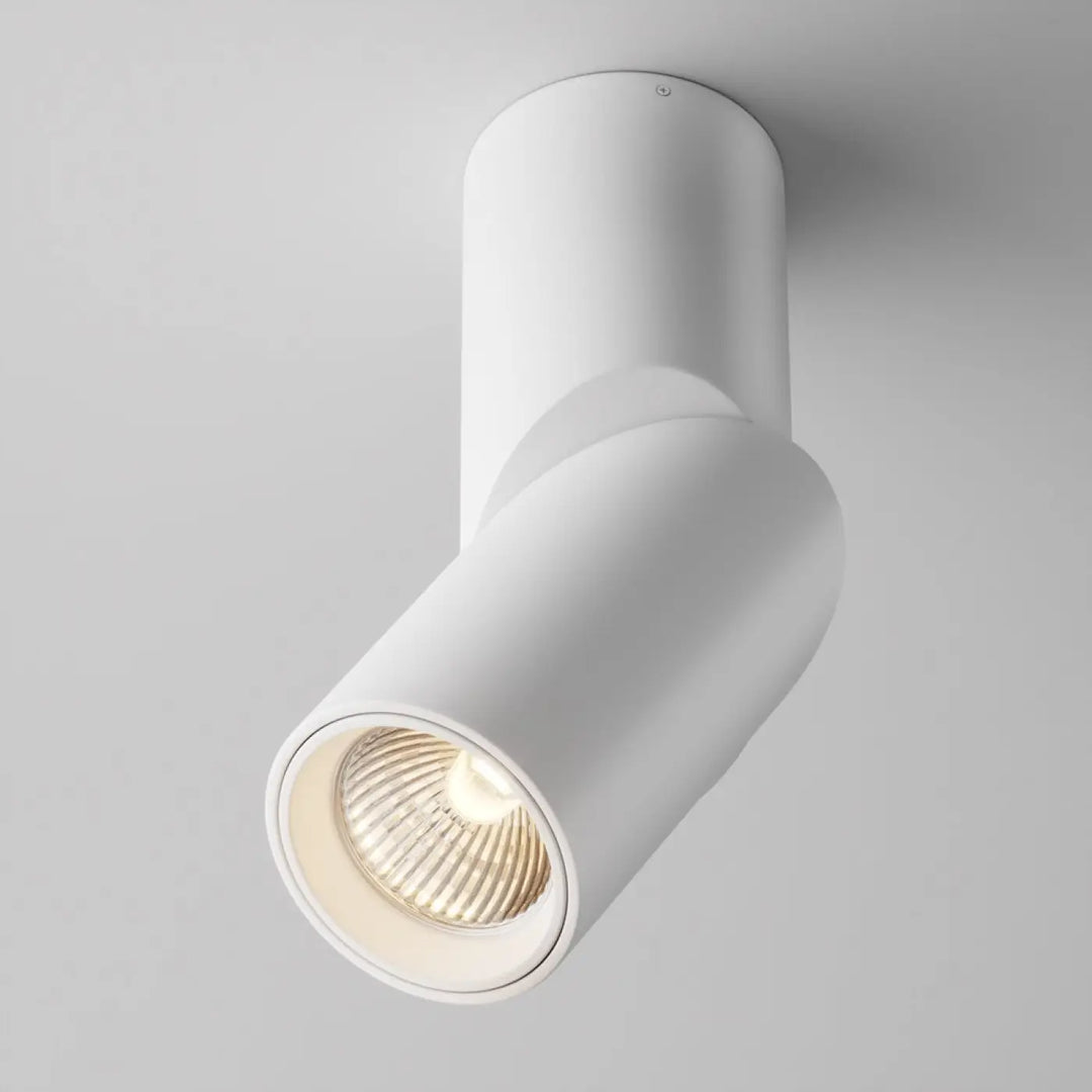 Applique murale kilt en acier noir avec profil plié, lumière led chaude et tête ajustable, design minimaliste blanc cylindrical
