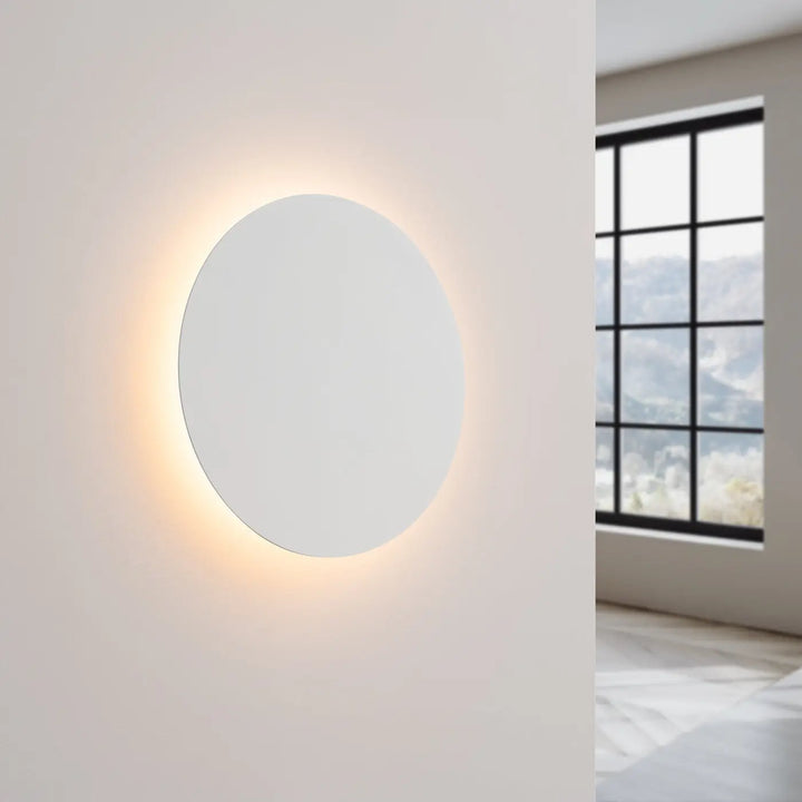 Applique murale BORGEN blanc allumée, halo lumineux sur le mur