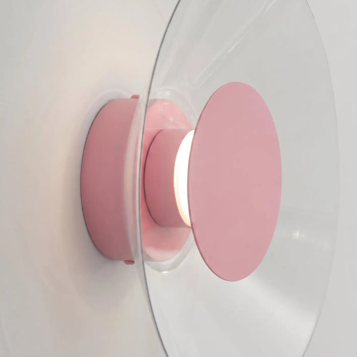 Applique murale ASTRO rose vue de profil, disque transparent