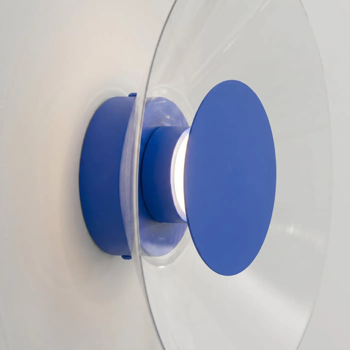 Applique murale ASTRO outremer vue de profil, disque transparent