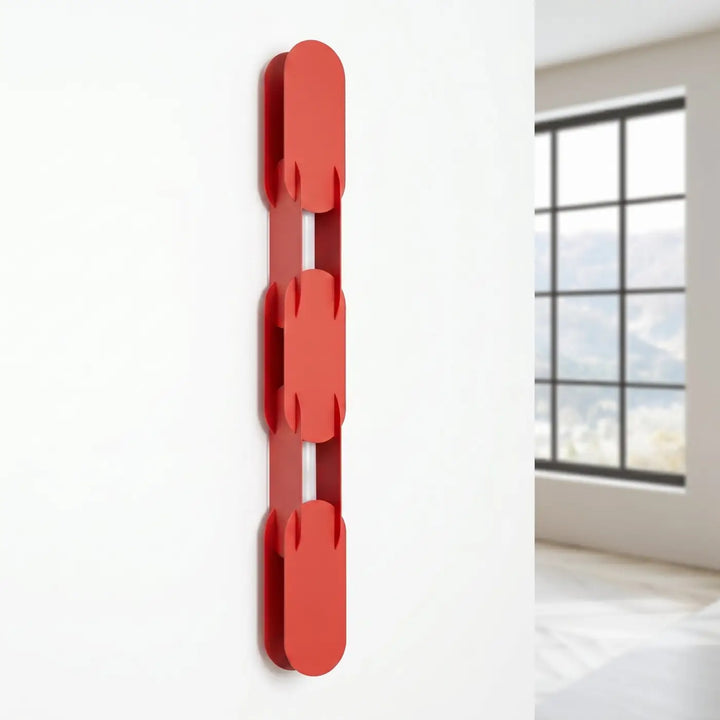 Applique murale CHAIN rouge éteinte, posée au mur
