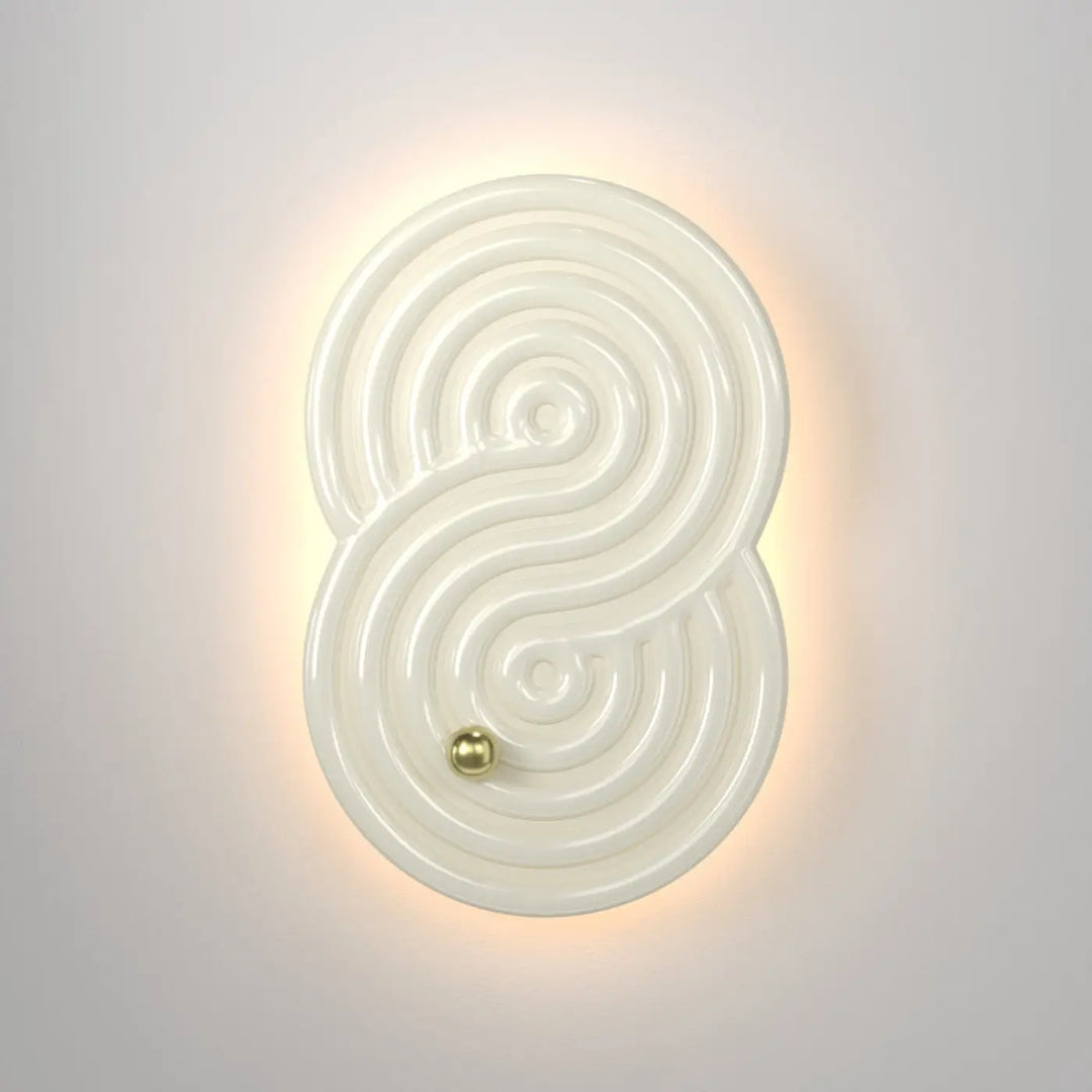 Applique murale cream colorée en céramique avec design tourbillonnant et accent doré pour rock garden applique murale led
