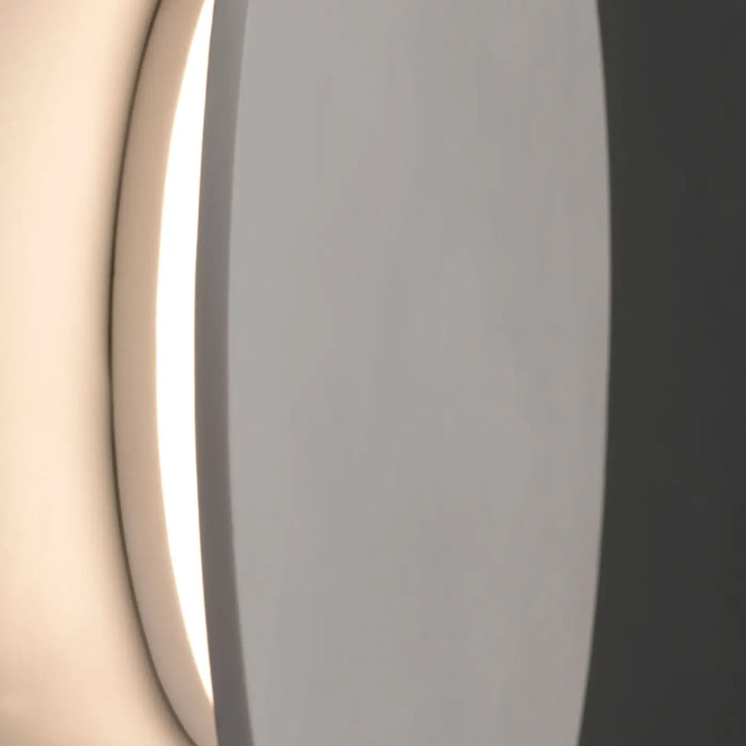 Détail de l'applique Luna en plâtre