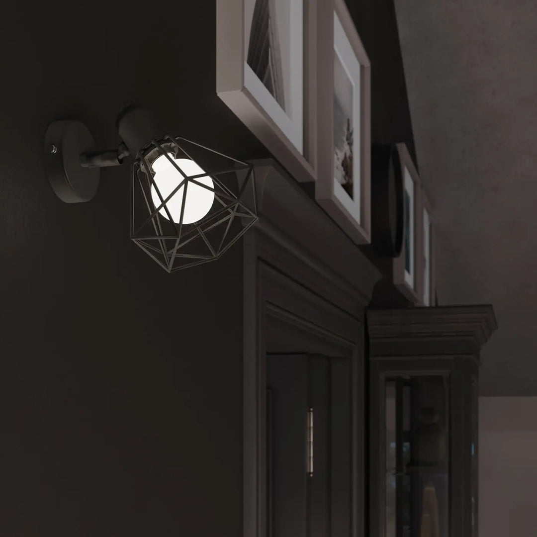 Applique murale série artemis noire en métal géométrique avec ampoule blanche pour créer une atmosphère intime