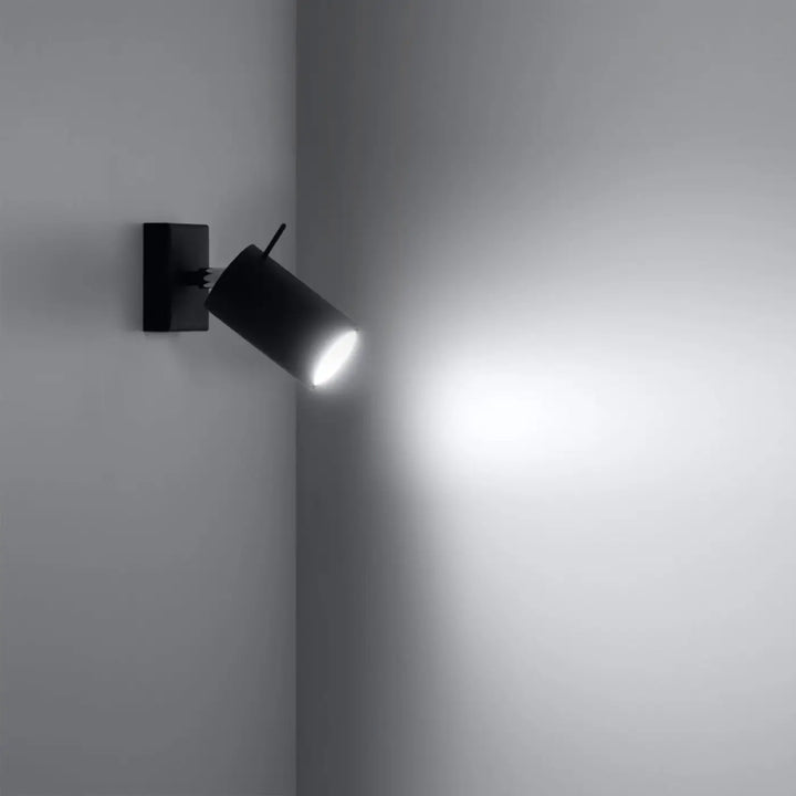 Applique murale noire ring avec bras mobile et tête cylindrique pour une totale liberté d aménagement