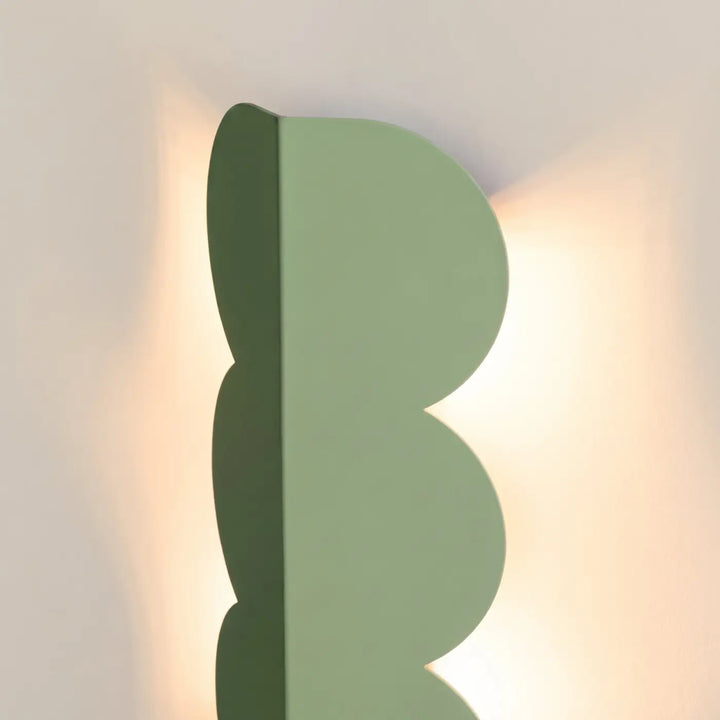Applique murale BISCUIT sauge allumée, vue de profil
